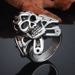 Punk rocker skull ring with mechanical wrench design in vintage silver finish