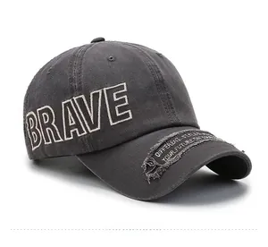 Side view of dark gray washed baseball cap with BRAVE embroidery and vintage distressed patch