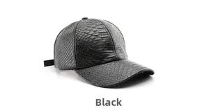 Detail of black faux snake skin leather baseball cap with textured scale pattern