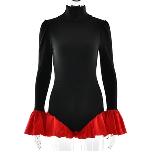 Detail of black long sleeve bodysuit with high neck and vibrant red ruffle trim details