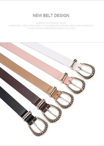 Five assorted vintage leather belts with oval gold buckles in classic neutral colors