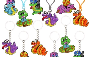 Collection of cartoon PVC snake keychains in various colorful character designs