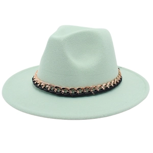 Detailed view of mint green felt jazz hat featuring a gold and black woven chain band