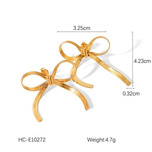 Close-up of 18k gold-plated snake chain bow earrings with size and weight measurements