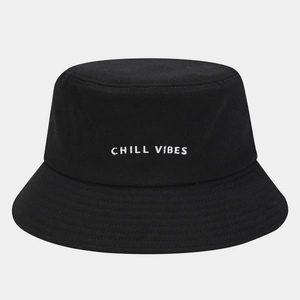 Classic black canvas bucket hat with white 'CHILL VIBES' embroidery for sun protection
