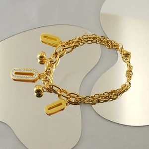 Bracelet chaîne épaisse en acier inoxydable 18K doré avec breloques ovales en strass