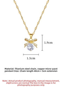 Detailed view of bow pendant with zircon stone and 40cm titanium steel chain dimensions