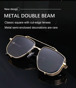 Macro shot of gold metal double beam and black square lenses on punk style sunglasses