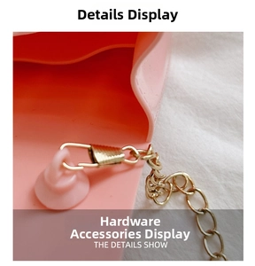 Detail shot of the golden metal chain hardware and pink PVC quilted jelly bag link
