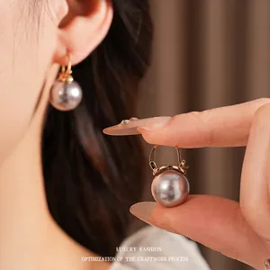 French vintage gold hoop earrings with gray pearls for a minimalist elegant style