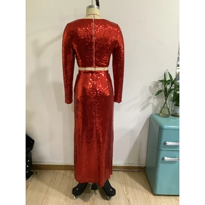 Detail of red sequin two-piece skirt set with long sleeve crop top and back zipper