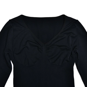 Detail view of black V-neck knitted bodysuit featuring ruched chest and ribbed texture