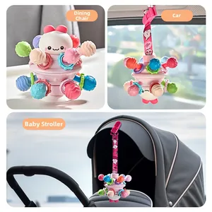 Multi-use infant Manhattan ball teether shown clipped to high chair and stroller