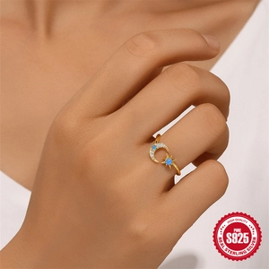 Gold S925 sterling silver moon and star open ring with blue opal and white crystals