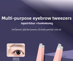 Close-up of pink stainless steel slanted eyebrow tweezers for precise hair removal
