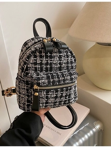 Classic black and white tweed mini backpack with gold hardware and PU leather trim