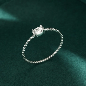 Minimalist S925 sterling silver rope band ring with an oval-cut moissanite stone