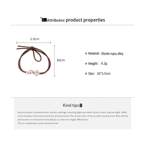 Detail view of elastic hair tie with cute cat and fishbone charms showing precise dimensions