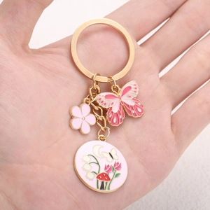 Pink butterfly and flower enamel charm keychain with gold metal ring for women