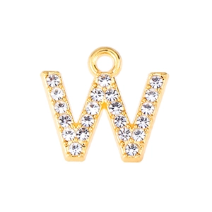 Macro shot of gold-plated letter W pendant with clear rhinestones for jewelry making
