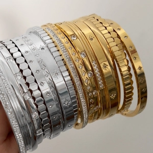 Vintage stainless steel stacked bracelets featuring zircon stars and honeycomb patterns