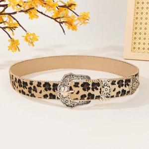 Leopard print waist belt with vintage gold buckle and metal bead edges on white surface