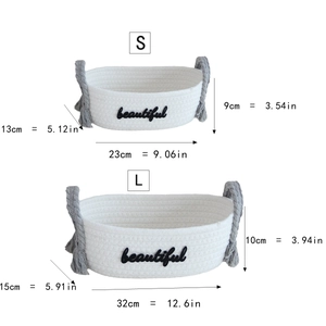 Detailed size comparison of small and large woven cotton storage baskets with dimensions