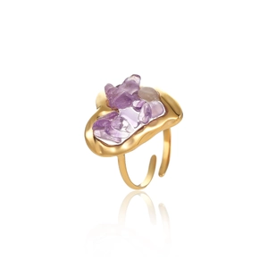 Macro shot of 18K gold plated ring with irregular purple stones and adjustable band