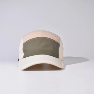 Detail of five-panel color-block outdoor cap in pink, olive green and cream white nylon