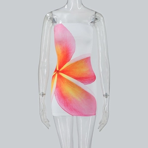 Detail of slim strapless dress with vibrant pink and orange floral print patterns