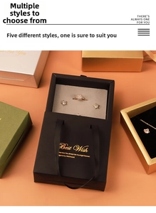 Luxurious jewelry gift box set with sparkling ring and necklace in elegant drawer packaging
