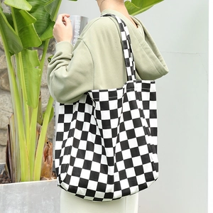 Classic black and white checkerboard canvas tote bag for women with large shoulder straps