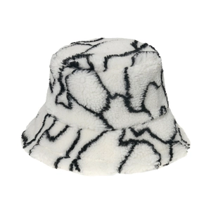 Winter lamb wool bucket hat with black wave patterns on white plush textured fabric