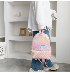 Detail of pink mermaid backpack with sequin scales and embroidered fishtail decoration