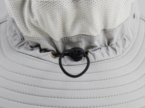 Detail of grey sun hat showing breathable white mesh fabric and adjustable drawstring toggle