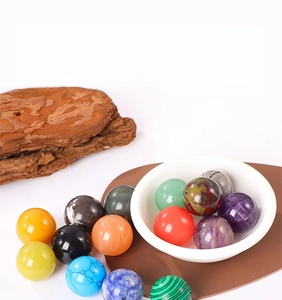 Close-up of various natural stone beads like amethyst and agate for DIY jewelry