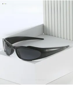 Close-up of sleek black wrap-around sports sunglasses with streamlined wide temples
