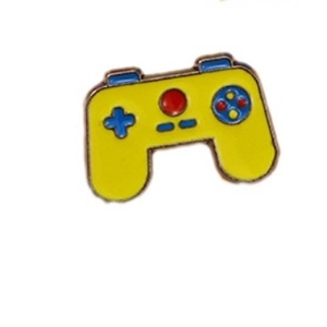 Cute yellow game controller enamel pin with blue buttons and gold-toned metal borders