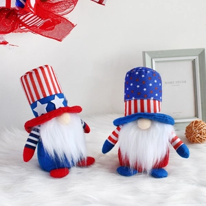 Two patriotic American Independence Day gnomes with stars and stripes theme on white rug