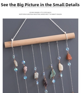 Detail of natural crystal stones and metal chains hanging on a wooden wall decor