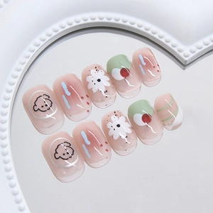 Pink sheer press-on nails with cute hand-painted puppy and flower art on mirror display