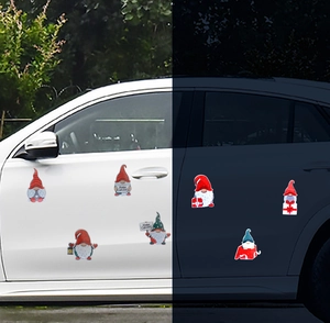Day and night comparison of reflective Christmas gnome car magnets showing high visibility