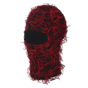 Distressed red and black knit balaclava mask with fringe detail and outdoor insulation