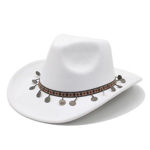 Detail of white cowboy hat with bohemian geometric band and metallic disc charms