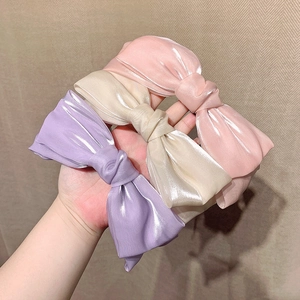Elegant double-layered mesh bow headbands in pink, beige, and purple satin fabric