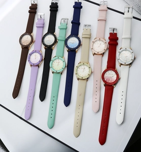 Collection of nine colorful quartz watches for women with wavy textured dial and leather straps