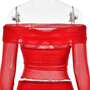 Detail of red mesh off-shoulder long sleeve top with elegant pleated texture