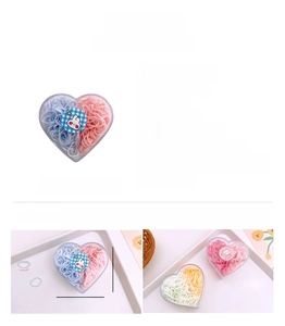 Macro view of macaron TPU hair bands in heart box with dimensions and material specs