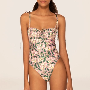 Pink floral one-piece swimsuit with ruffle trim and adjustable tie straps for women