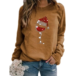 Detail of Christmas wine glass print on brown long sleeve sweatshirt for women